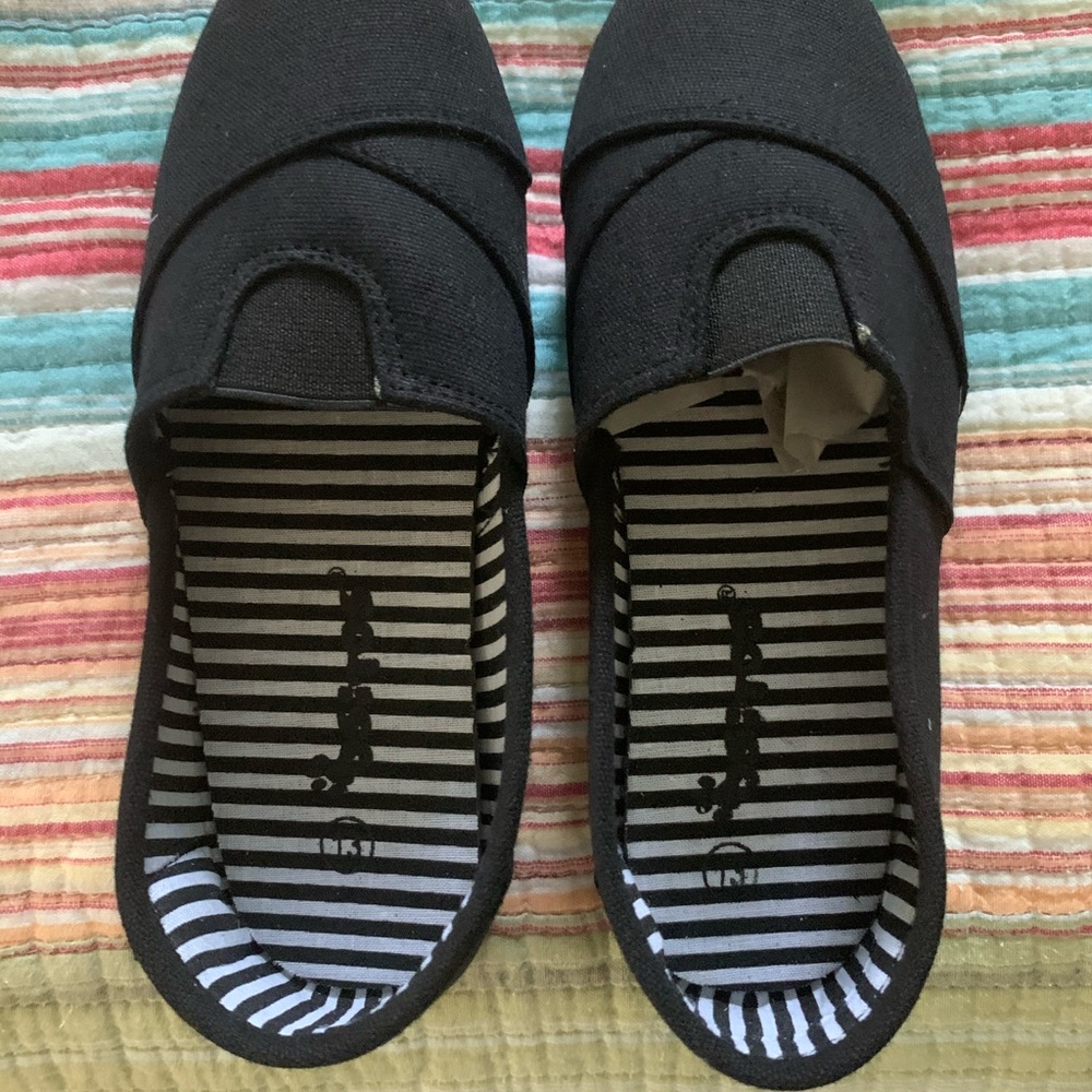 Black slip on canvas shoes